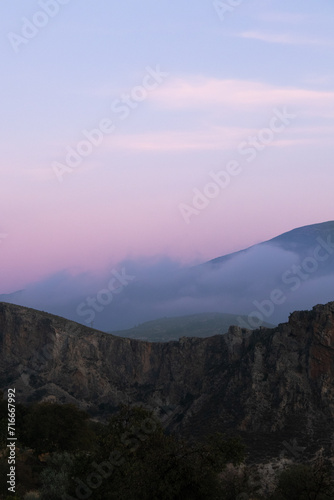 A stunning purple and blue sunset over the mountains 