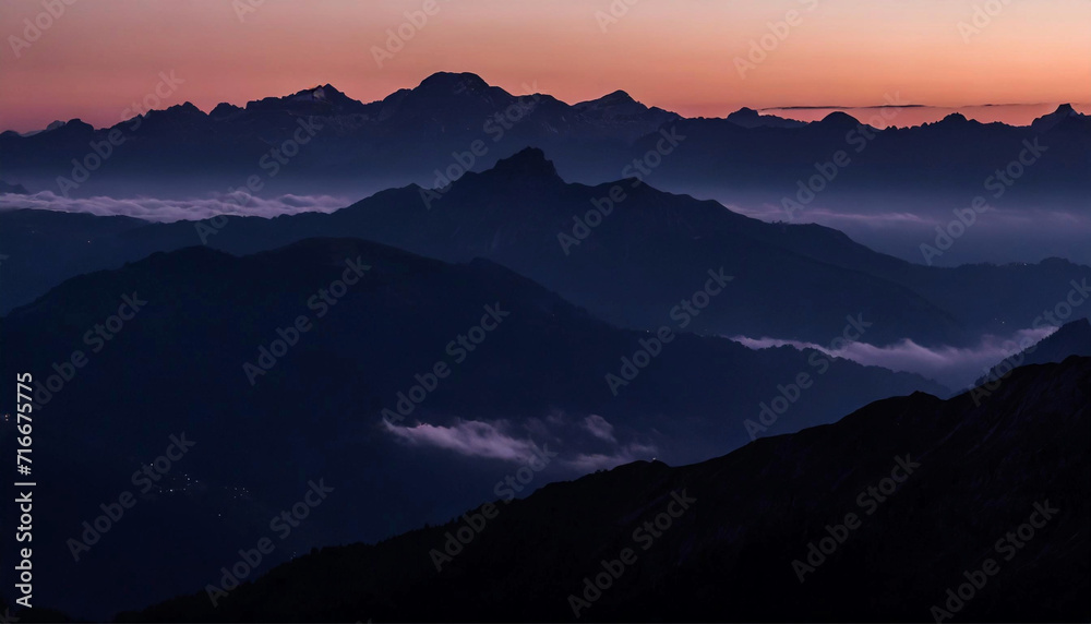 Layers of mountains after sunset. Mountain landscape in beautiful, subdued colors