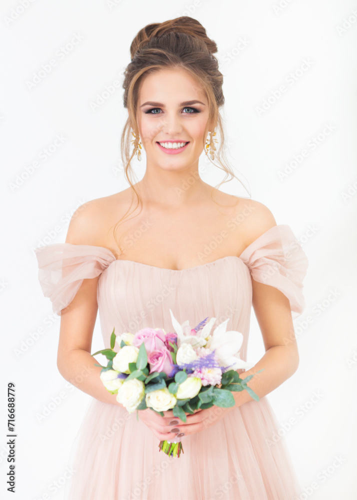 Young pretty bride with bridal bouquet indoors Young pretty bride with bridal bouquet indoors