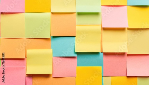  a multicolored wall with lots of post it notes attached to the sides of each of the walls and the bottom half of each of the walls is different colors. © Jevjenijs