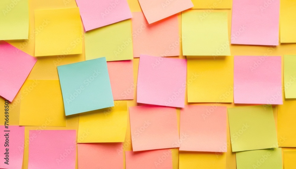  a bunch of colorful post it notes on a yellow and pink background with the words happy new year written on one side of the post it and the post it.