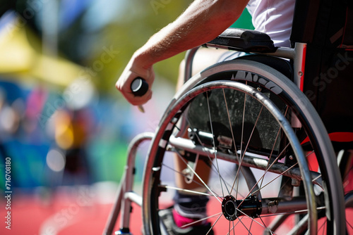 close-up of a wheelchair user participating in an adaptive sports event  emphasizing the competitive and active aspects of wheelchair life in a minimalistic photo