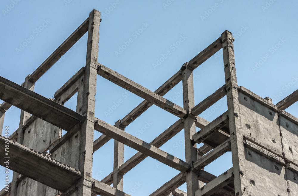 abstract background fragment of a building from concrete blocks on a light background