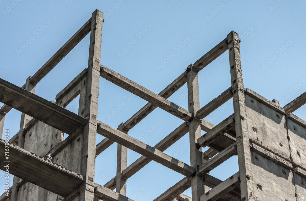 abstract background fragment of a building from concrete blocks on a light background abstract background fragment of a building from concrete blocks on a light background