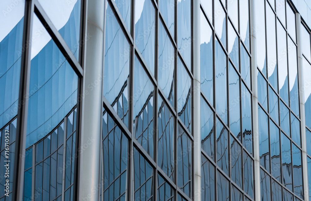 abstract background reflected in the glass windows of the building abstract background reflected in the glass windows of the building