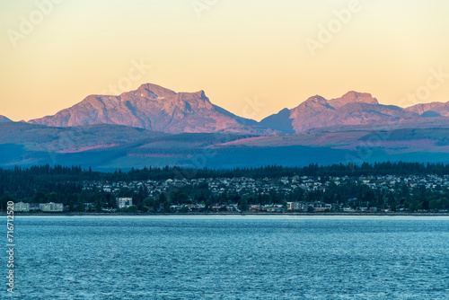 Leinwand Poster Campbell River at sunrise seen from Quadra Island, Vancouver Island, British Columbia, Canada