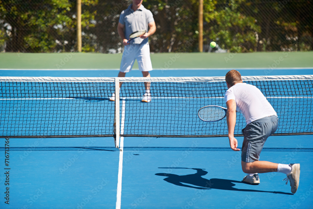 Tennis, game and men with fitness, back and competition with training and challenge with a match. Players, friends and guys with rackets and court with workout and sunshine with sports and ball