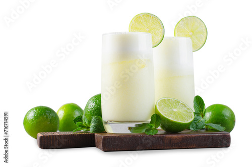 Brazilian Lemonade, Refreshing Creamy Lemonade or Limeade with Lime Slices and Mint on White Isolated