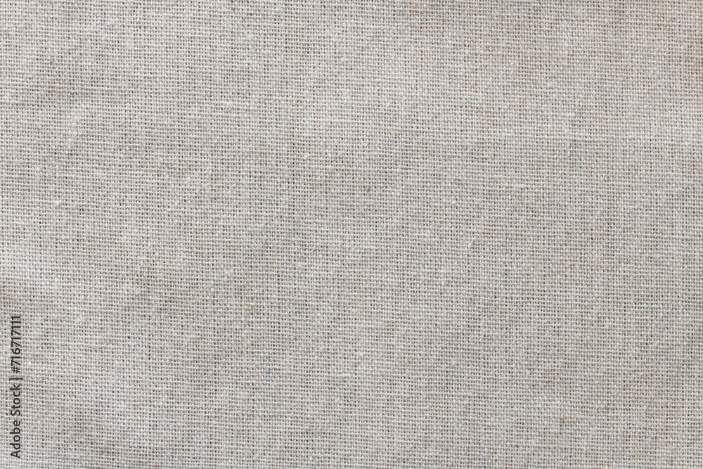 Light linen fabric as a background or texture. Light linen fabric as a background or texture.