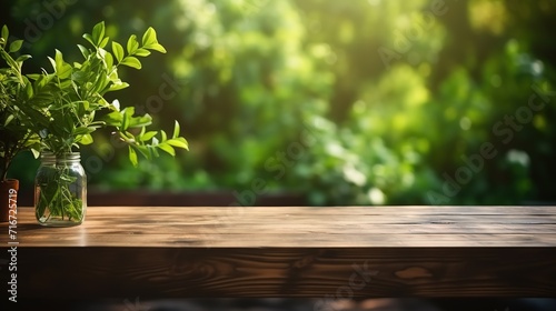 Empty wood table with blur green nature background. Wooden table top for product presentation.