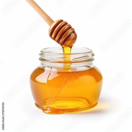 Jar with honey and honey dipper with drop of honey solated on white background