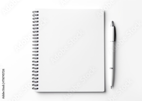 Blank notepad and pen on white background, education paperwork picture © Aamir