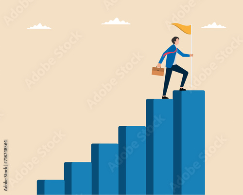 Businessman step on rise up graph for next goal ladder of success to reach goal