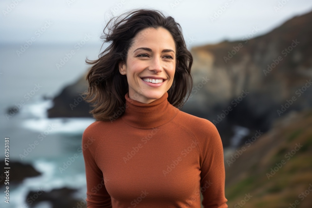 Portrait of a blissful woman in her 30s wearing a classic turtleneck sweater against a rocky shoreline background. AI Generation Portrait of a blissful woman in her 30s wearing a classic turtleneck sweater against a rocky shoreline background. AI Generation