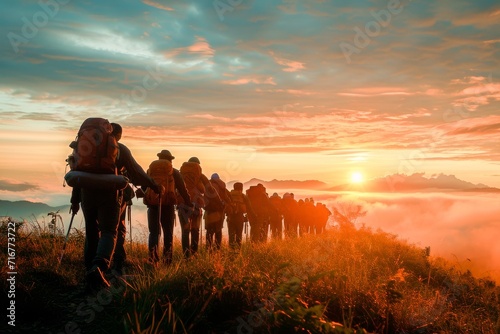 A group of hikers holding hands against a stunning sunrise, symbolizing adventure and friendship amidst the beauty of nature.