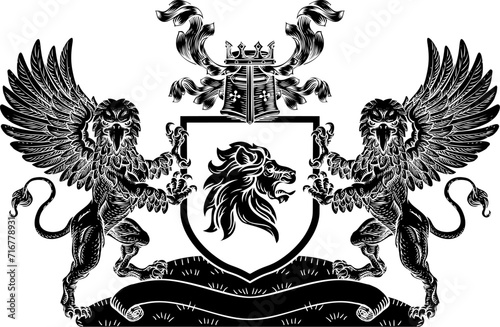 A crest coat of arms family shield seal featuring two griffins or griffons and lion photo