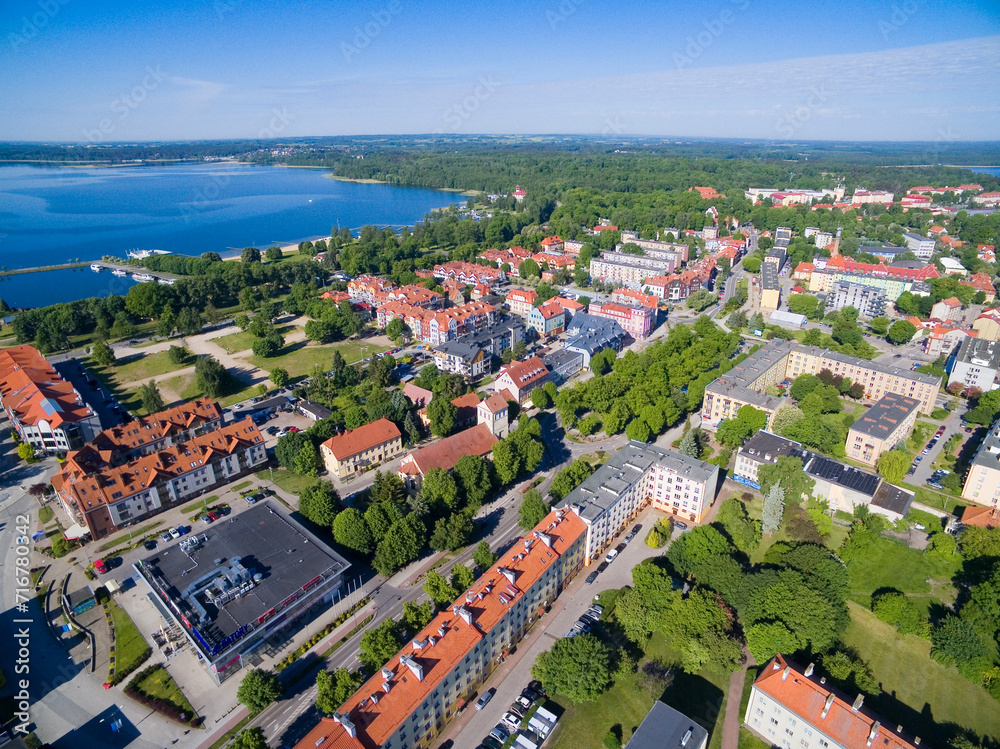 Aerial view of Gizycko town, Poland (former Loetzen, East Prussia). Lutheran Church in the foreground