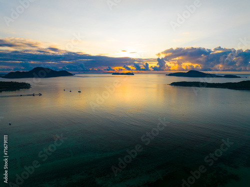 Amazing sunset or sunrise sky over sea landscape,Beautiful colorful light of nature seascape background,Drone aerial view ocean background