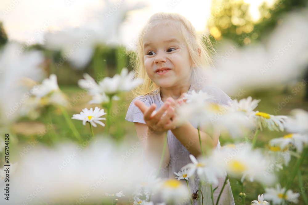 Children walk in the summer in nature. Child on a sunny spring morning in the park. Traveling with children. Children walk in the summer in nature. Child on a sunny spring morning in the park. Traveling with children.
