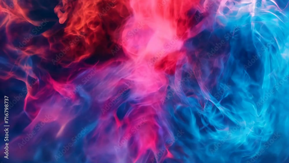 Vivid blue and pink smoke intertwining, expressing abstract beauty

