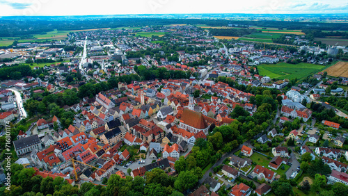 Aerial around the old town of the city Schrobenhausen in Bavaria on a cloudy day in summer © Werner_Media