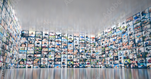 Digital wall with screens featuring various people. Modern global communication and network
