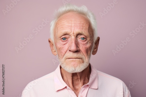 Portrait of a glad man in his 80s wearing a simple cotton shirt against a pastel or soft colors background. AI Generation