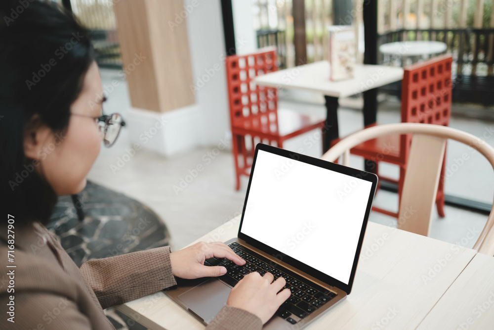 A blank screen for hand typing text,using laptop contact business searching information in workplace on desk at office. A blank screen for hand typing text,using laptop contact business searching information in workplace on desk at office.