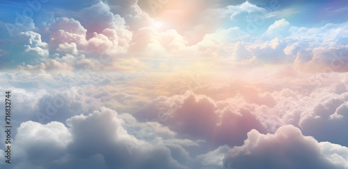 This is exactly what heaven looks like - looking over the top of a blanket of gorgeous pastel coloured fluffy clouds depicting heavenly lansdcape background ideal for a spiritual theme
