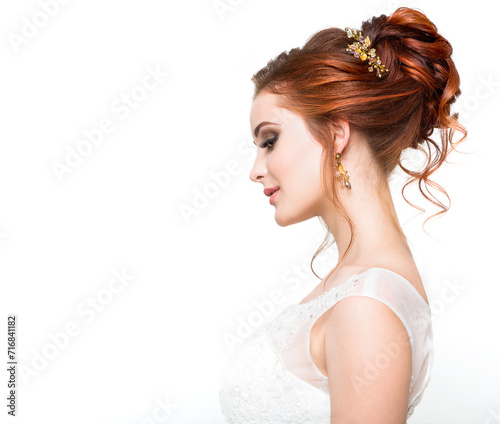 Young pretty caucasian bride in wedding dress