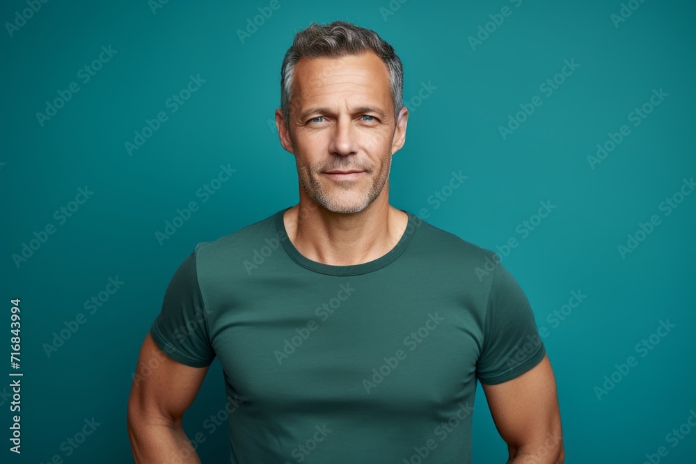 Portrait of a tender man in his 40s dressed in a casual t-shirt against a solid color backdrop. AI Generation Portrait of a tender man in his 40s dressed in a casual t-shirt against a solid color backdrop. AI Generation