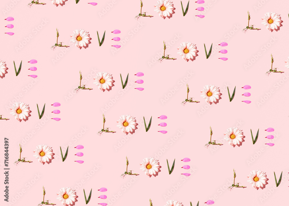 Love celebration, pattern made of flowers on pastel pink background, romantic, natural concept. 