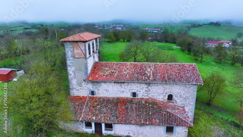 Landscape around the Church of San Juan Bautista in Oyardo in the municipality of Urcabustaiz. Aerial view from a drone. Oyardo. Alava. Basque Country. Spain. Europe photo