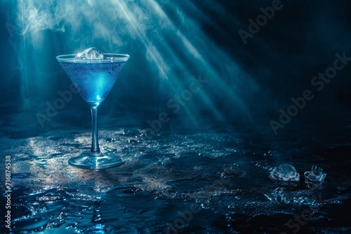 Ocean Blue cocktail in dark waters with backlight, dark food photo, low key