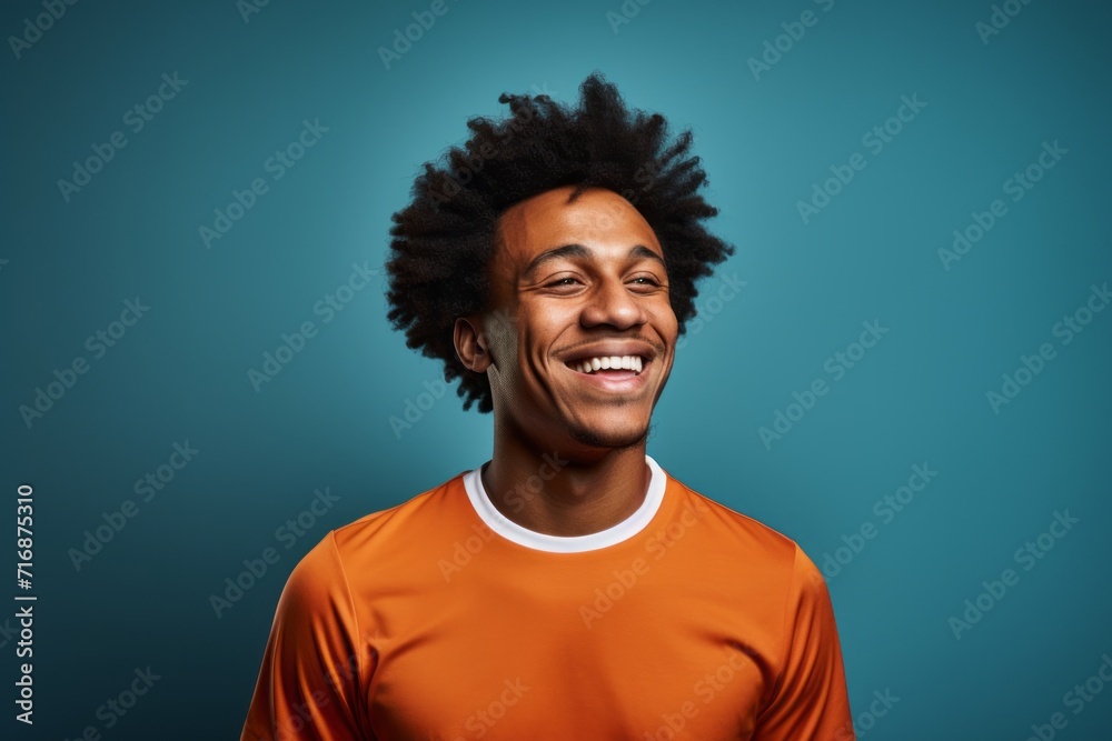 Portrait of a happy afro-american man in his 20s sporting a breathable mesh jersey against a plain cyclorama studio wall. AI Generation Portrait of a happy afro-american man in his 20s sporting a breathable mesh jersey against a plain cyclorama studio wall. AI Generation