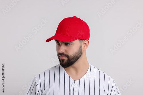 Wallpaper Mural Man in stylish red baseball cap on white background Torontodigital.ca