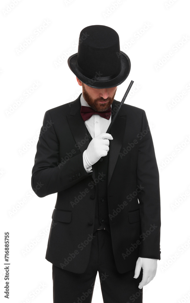 Magician in top hat holding wand on white background Magician in top hat holding wand on white background