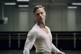 Portrait of a concentrated mature man practicing ballet in a studio. With generative AI technology