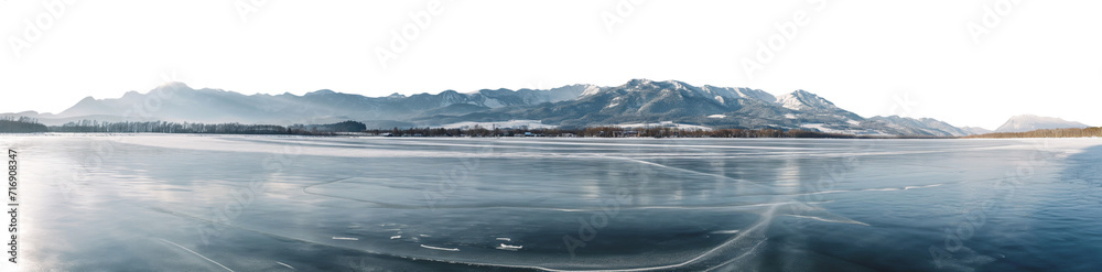 Vast panoramic shot of a Frozen lake. Mountain range. Frozen water surface. Vast fantasy cold sunny landscape. Frozen river. Frozen ocean. Frozen sea. Frozen Shore. Pen tool cutout. 