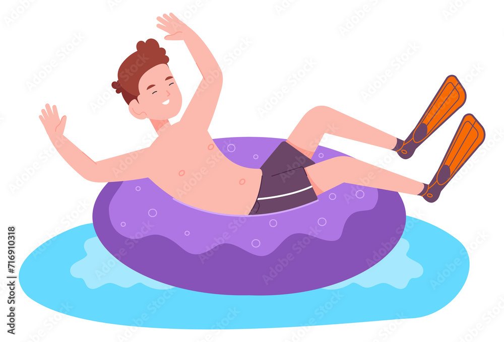 Funny kid in flippers. Diving kid on floating donut Funny kid in flippers. Diving kid on floating donut