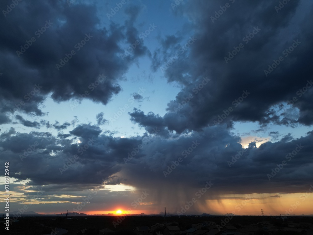 clouds and rain at sunset