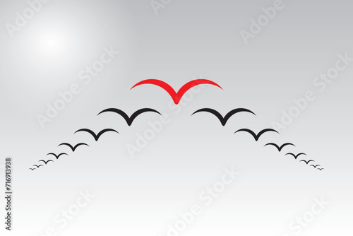 Vector illustration of bird flock: red leader stands out  of black, symbolizing leadership