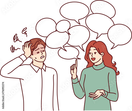Chatty woman irritates man clutches head and does not want to listen to girl standing among speech bubbles. Guy is experiencing tension and discomfort due to chatty girlfriend spreading gossip.