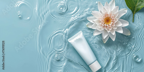 Serene Water Lily and Cosmetic Cream Tube mockup  copy space. A water lily and skincare blank tube float on water.