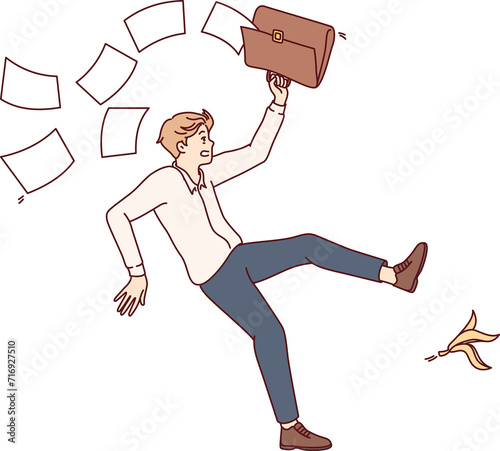 Falling man office employee slipped on banana peel and scattered documents from briefcase. Unfortunate guy slipped due to leftover food lying on ground and risks getting leg or head injury