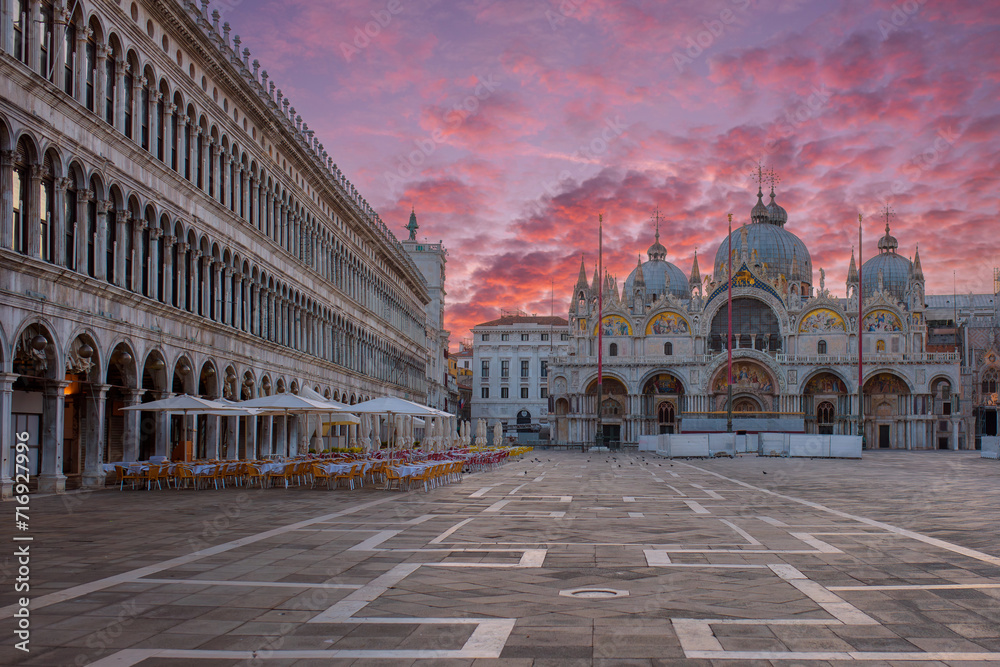 View of Basilica di San Marco and on piazza San Marco( St. Mark Square) at sunrise in Venice, Italy. 
