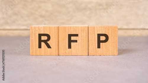 RFP acronym concept on cubes, gray background, selective focus