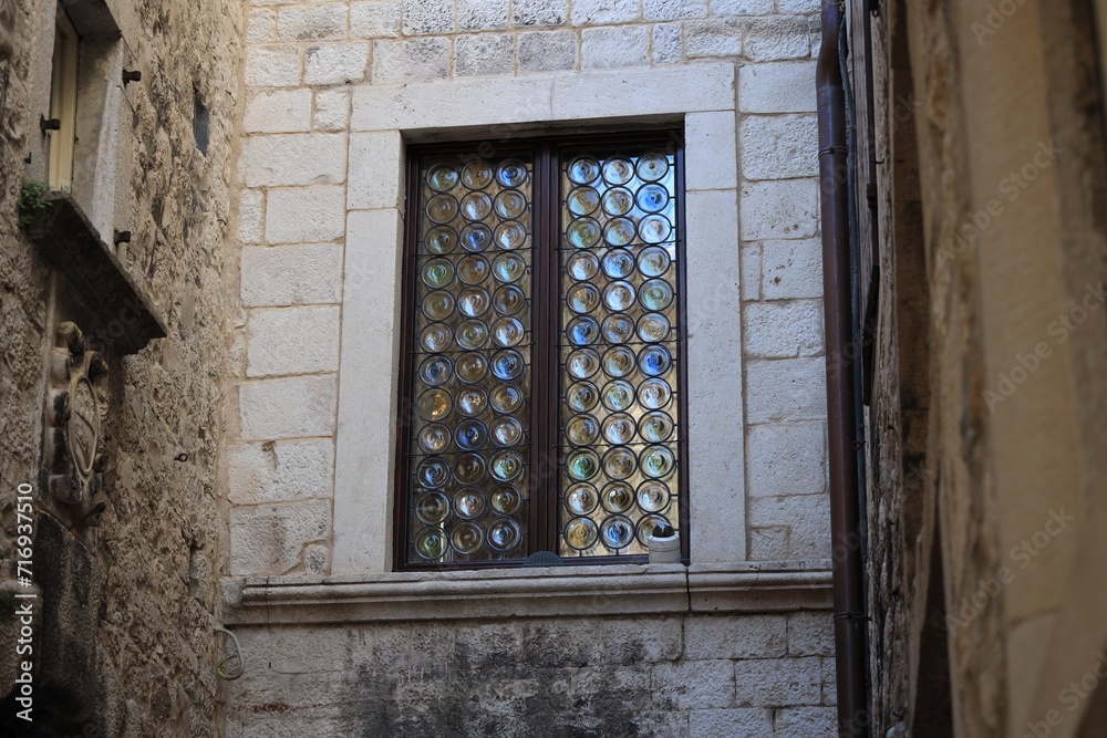 Obraz premium Old building with colorful stained glass window