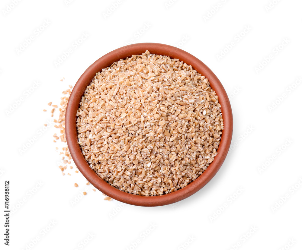 Dry wheat groats in bowl isolated on white, top view Dry wheat groats in bowl isolated on white, top view