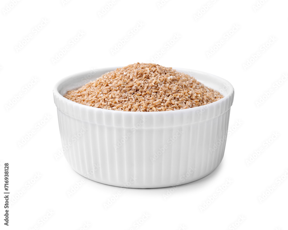 Dry wheat groats in bowl isolated on white Dry wheat groats in bowl isolated on white